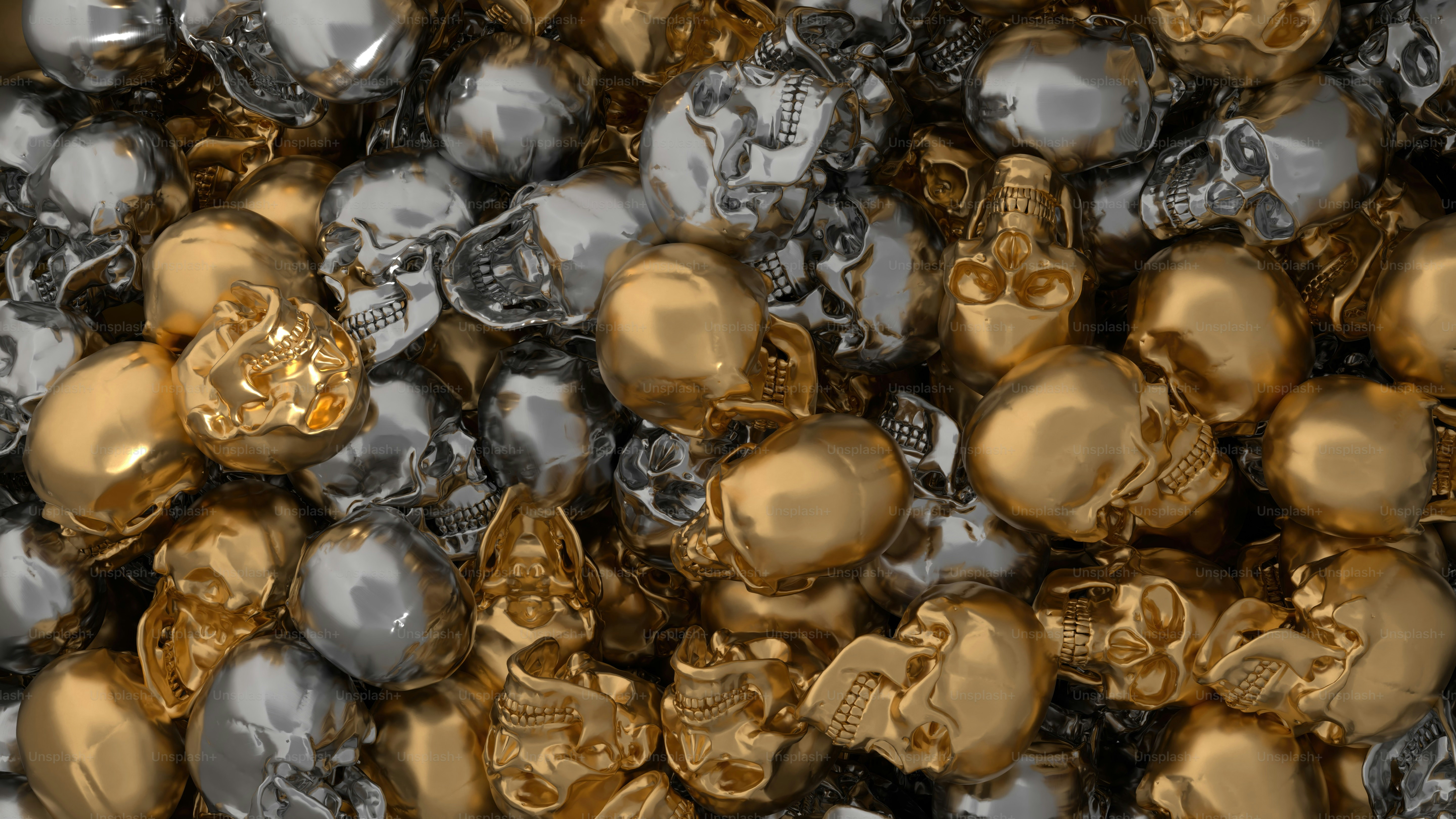 a pile of shiny gold and silver skulls